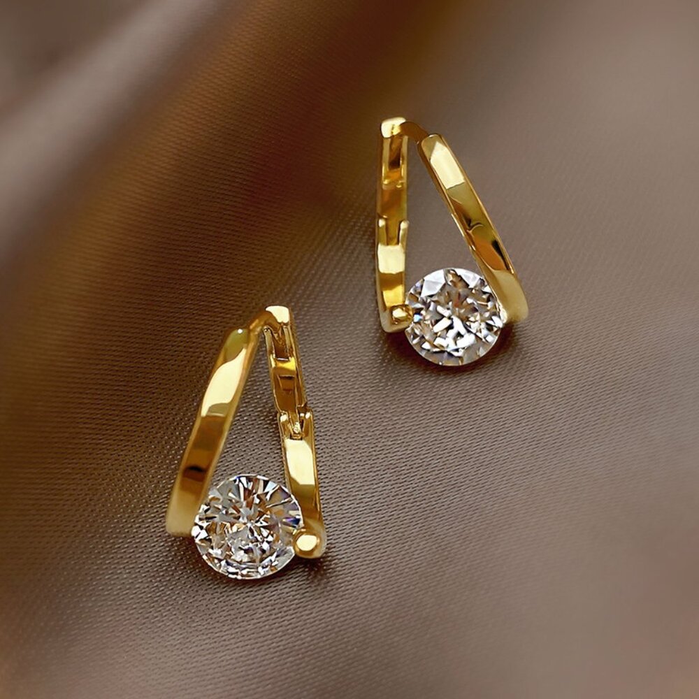 3/$35 Gold Tone Floating Solitaire Copper Huggie Earrings Clear CZ Diamond
